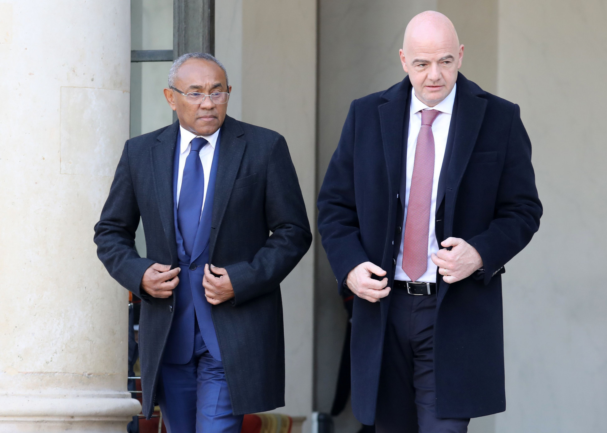 CAF President Ahmad, left, remains under investigation by FIFA's Ethics Committee ©Getty Images