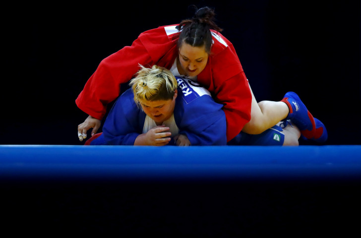 Anastasiia Sapsa of Ukraine, in red, beat Georgia’s world champion Elane Kebadze in the final of the women’s over-80 kilograms class today ©Getty Images