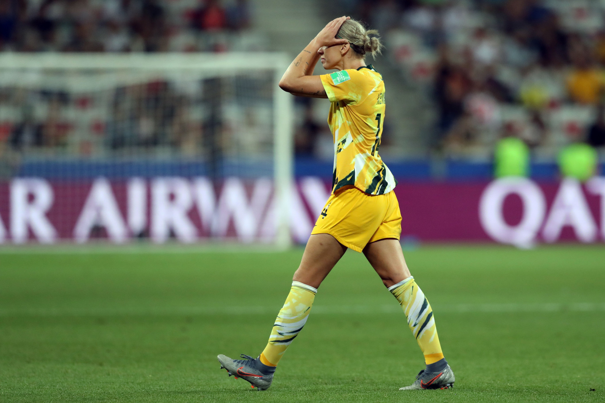 Australia's defender Alanna Kennedy leaves the pitch after getting a red card ©Getty Images