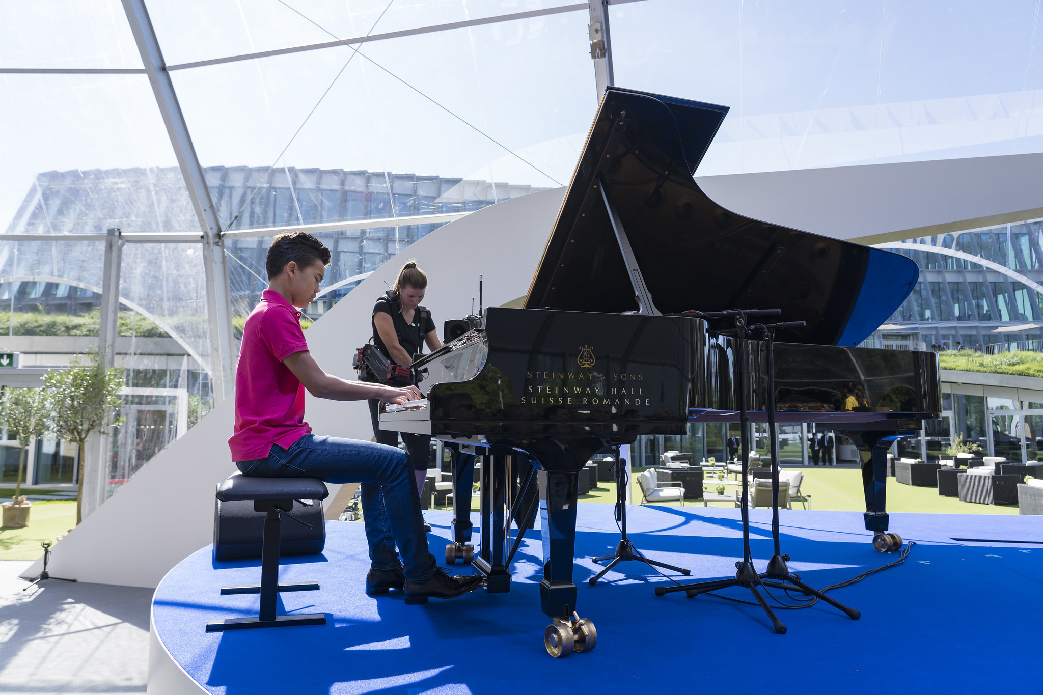 Teenage piano playing sensation Ricky Kam performed for the attendees at the event ©IOC
