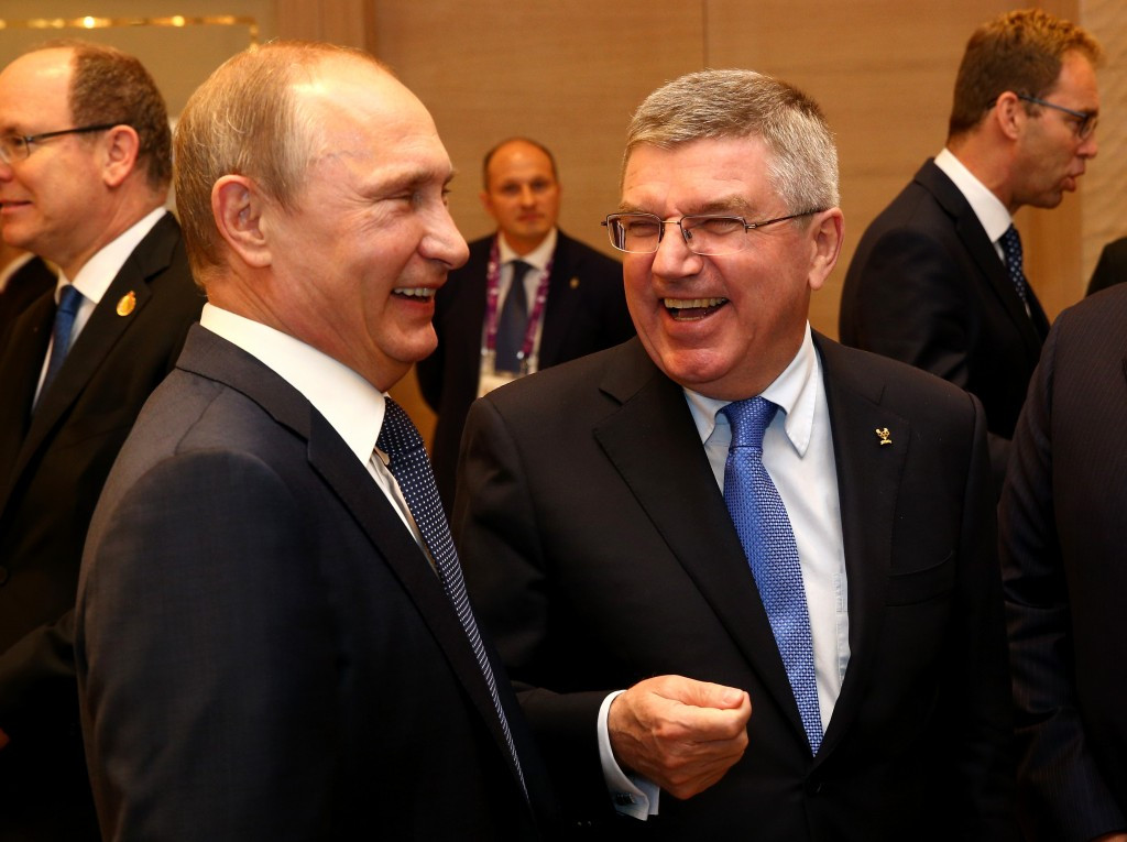 Russian President Vladimir Putin pictured with IOC counterpart Thomas Bach. Russia's state secret police, the FSB, is accused of being involved in systemic Russian doping in the WADA Report ©Getty Images