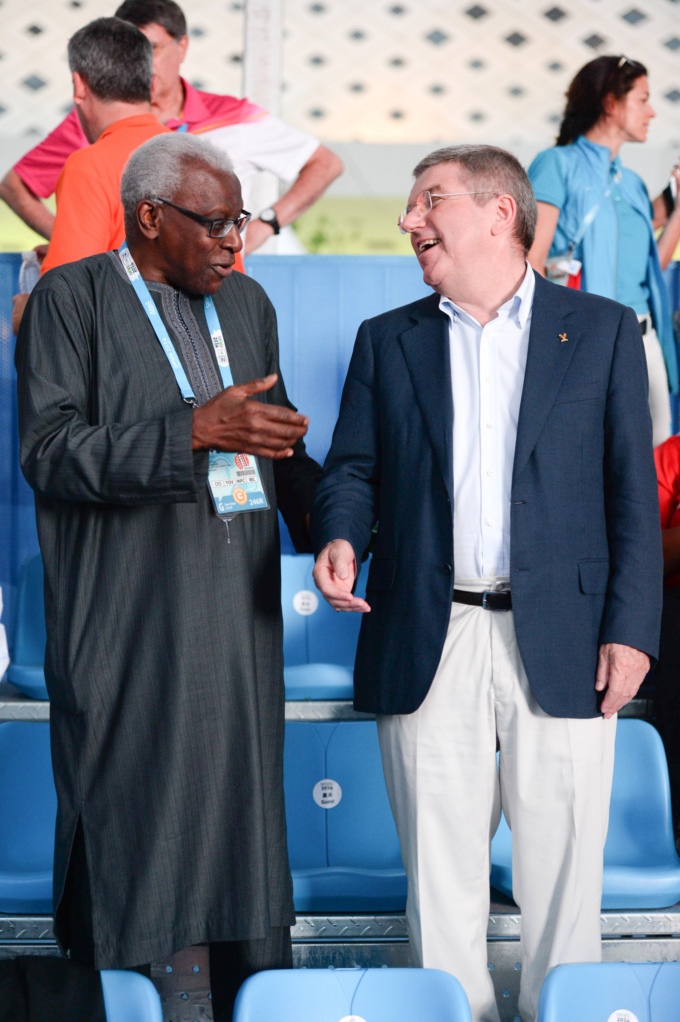 IOC President Thomas Bach, right, has claimed corruption allegations against former IAAF head Lamine Diack, left, have nothing to do with the Summer Youth Olympic Games due to take place in Dakar in 2022 ©Getty Images