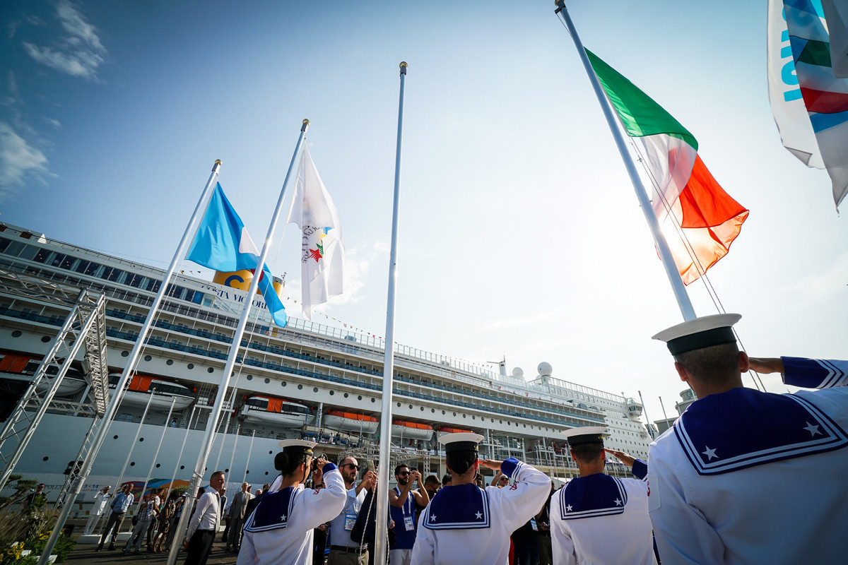 The International University Sports Federation and Italian flags were raised during the opening of the Athletes' Village for the 2019 Summer Universiade in Naples ©FISU