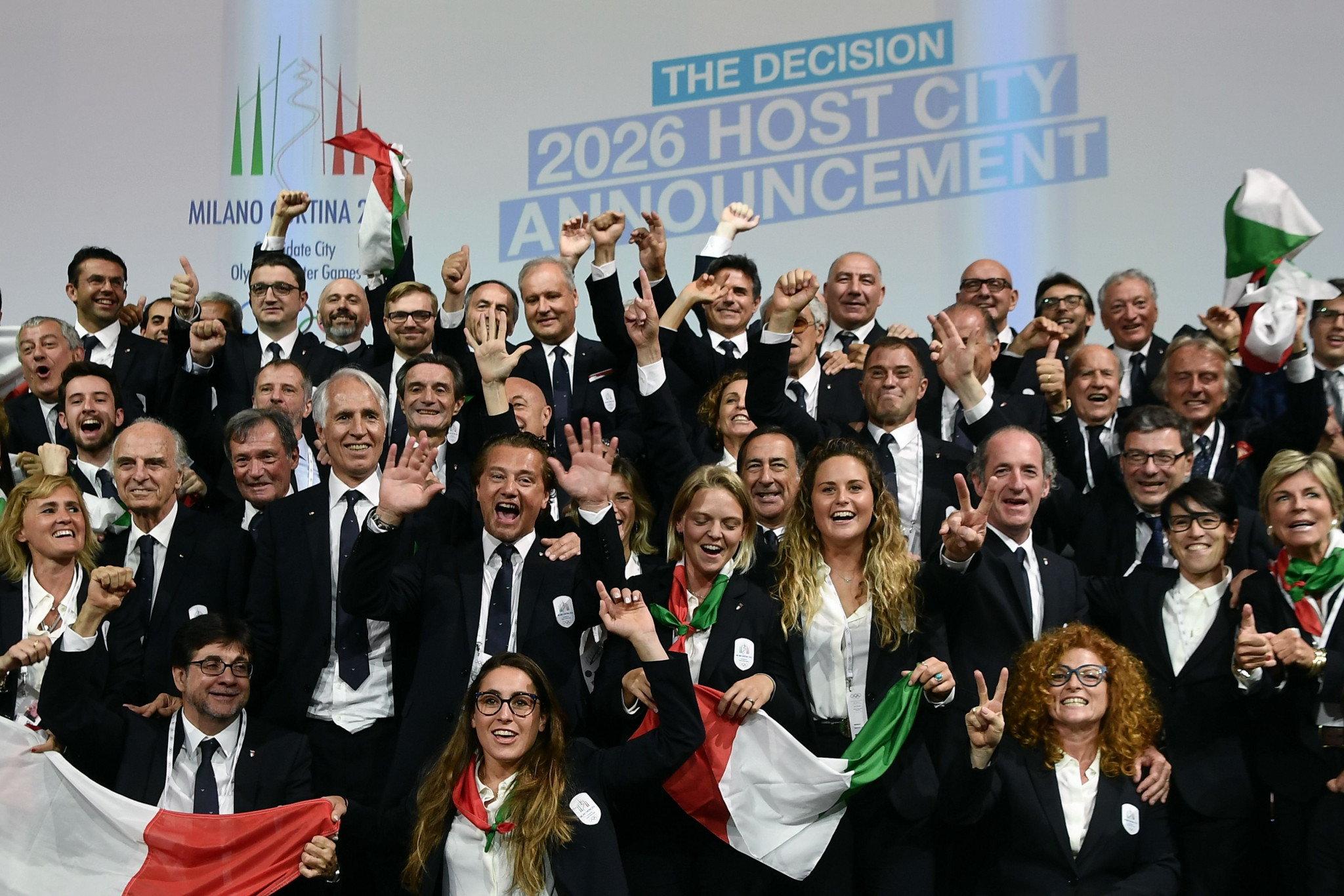 There were joyous scenes in the Italian delegation when the result was announced ©Getty Images