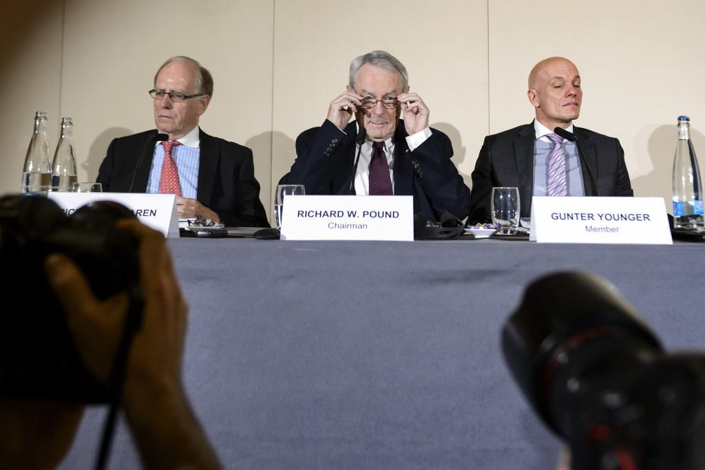 Thomas Bach was speaking followiing the findings of the WADA Independent Commission, chaired by Canadian IOC member Richard Pound (centre) ©Getty Images