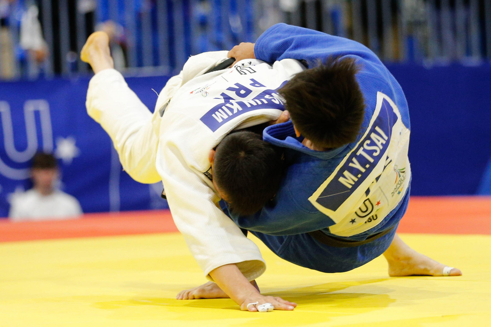 Japan dominate judo and gymnastics to go top of medal table