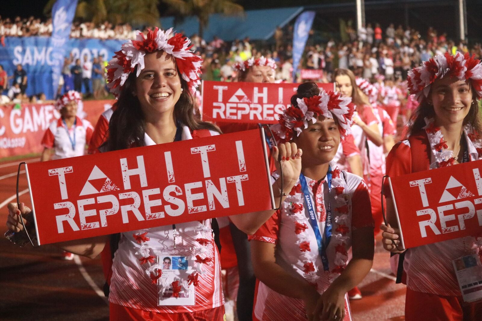 The Tahiti team provided a vibrant touch to the opening parade ©Roland Setu/Games News Service