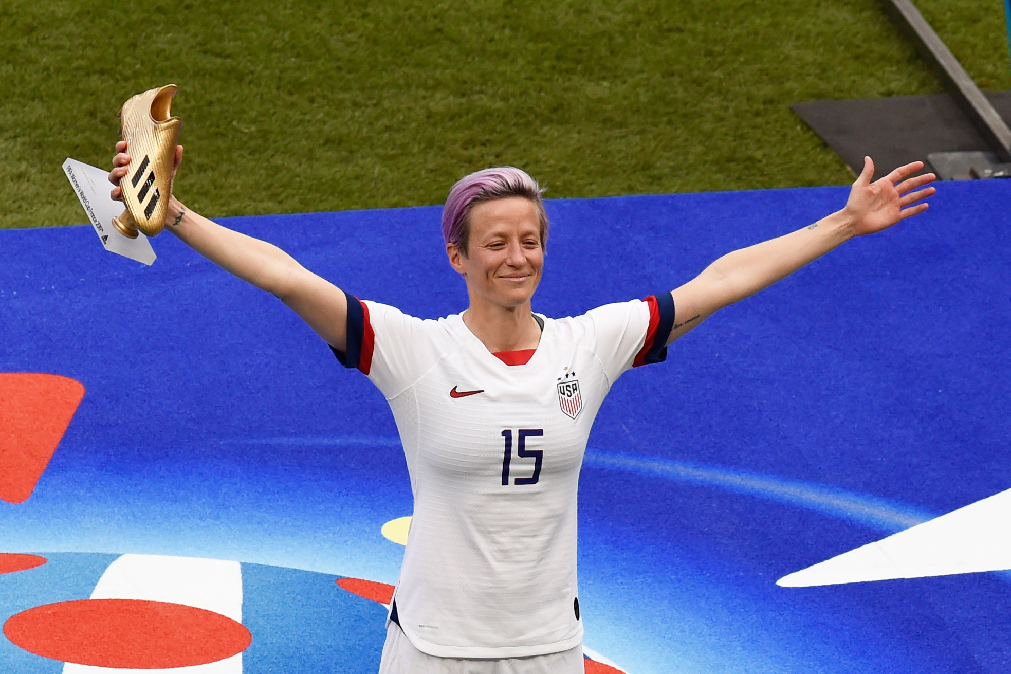 Rapinoe was presented with the Golden Boot after the match ©Getty Images