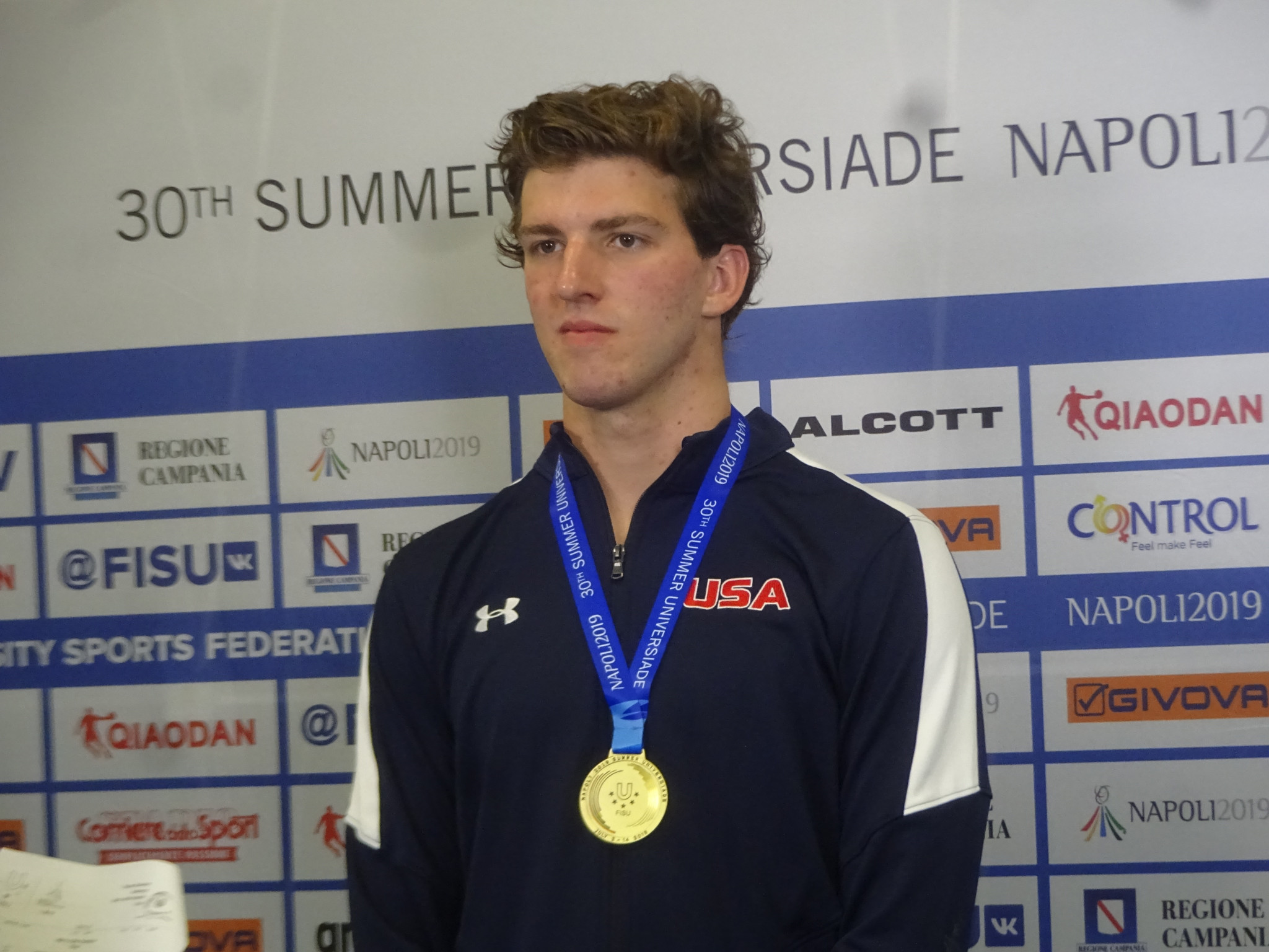 Zach Apple completed a hat-trick of gold medals as he won 100m freestyle gold at Piscina Scandone ©Philip Barker