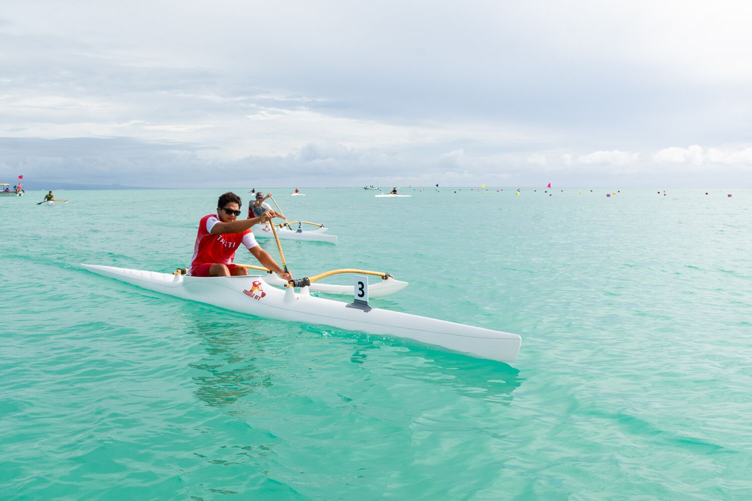 Competition in the outrigger canoeing event continued in idyllic conditions ©Games News Service