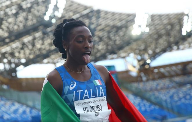Italy's Ayomide Folorunso needs a minute to breathe after retaining her women's 400m hurdle Universiade title ©Naples 2019