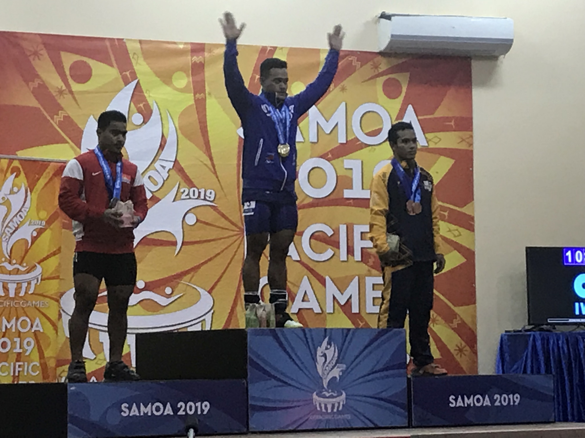 Samoa's Vaipava Nevo Ioane took all three gold medals in the men's 67kg weightlifting competition ©ITG