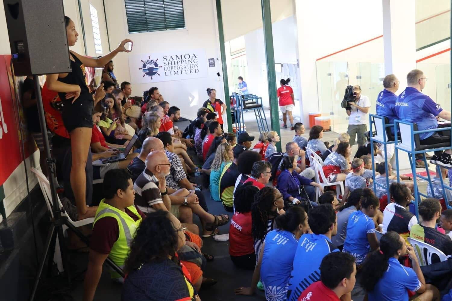 Plenty of fans and team mates crammed in to watch the squash action ©Games News Service