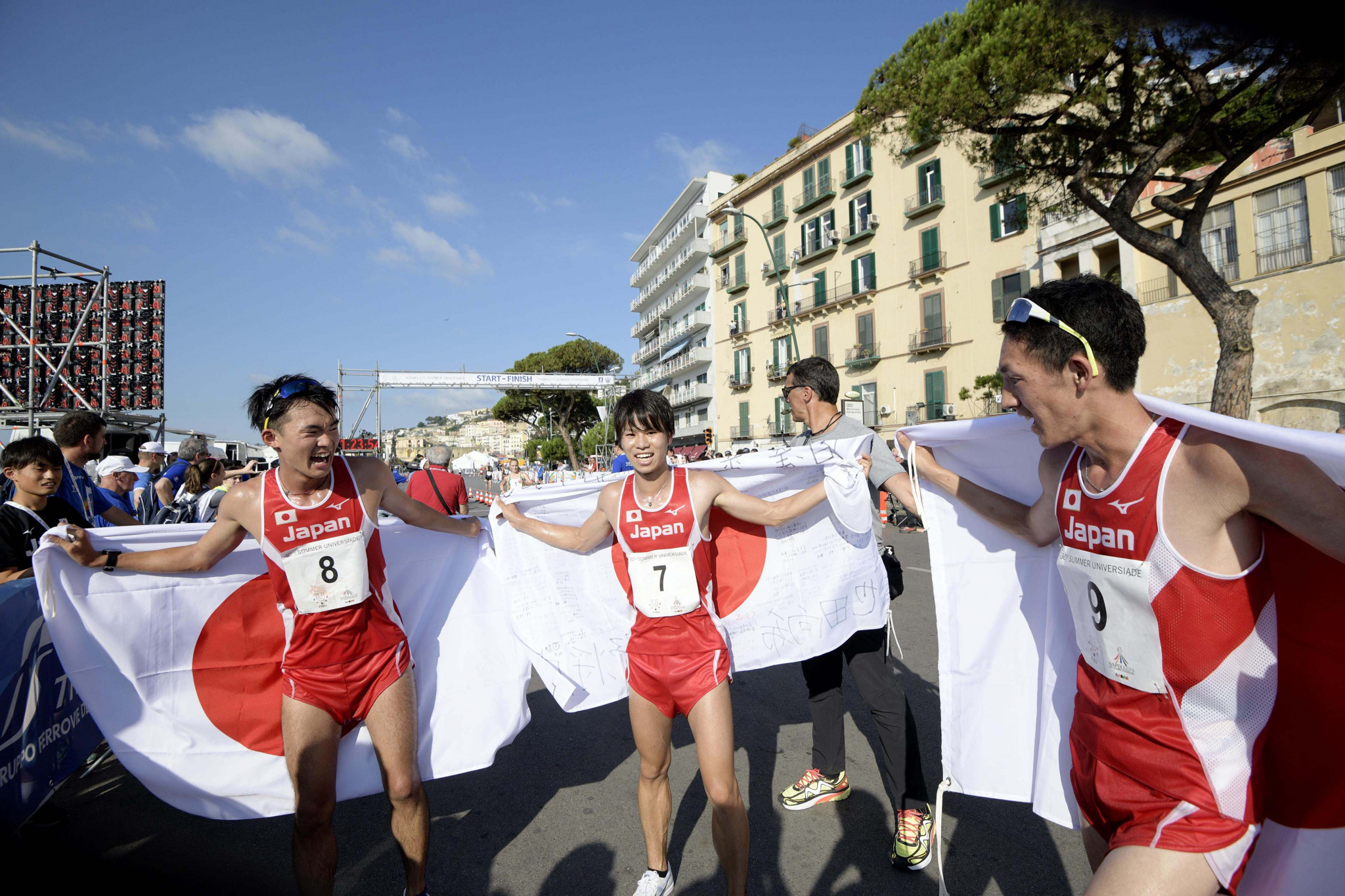 Japanese athletes were first, second and third in the men's 20km race walk ©Naples 2019