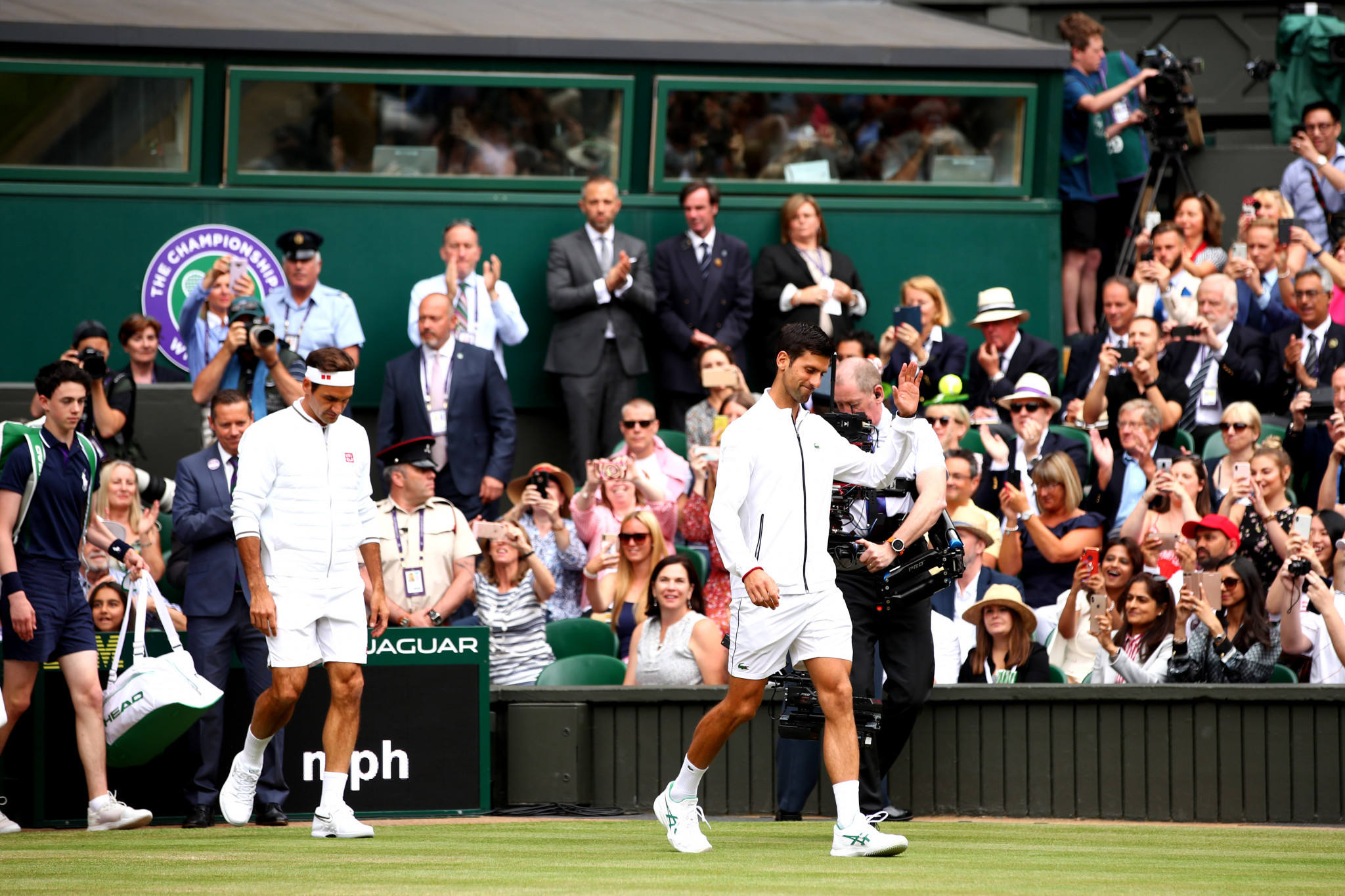 The scene was set for a Centre Court classic as Djokovic and Federer entered the arena ©Getty Images