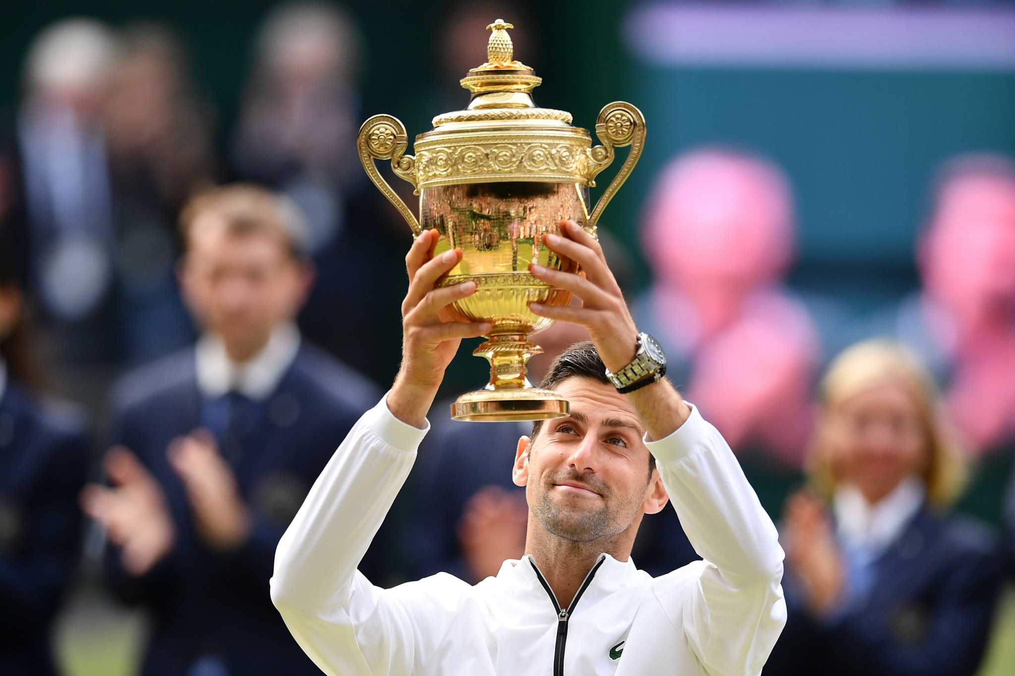 Novak Djokovic celebrates winning the Wimbledon title for a fifth time ©Getty Images