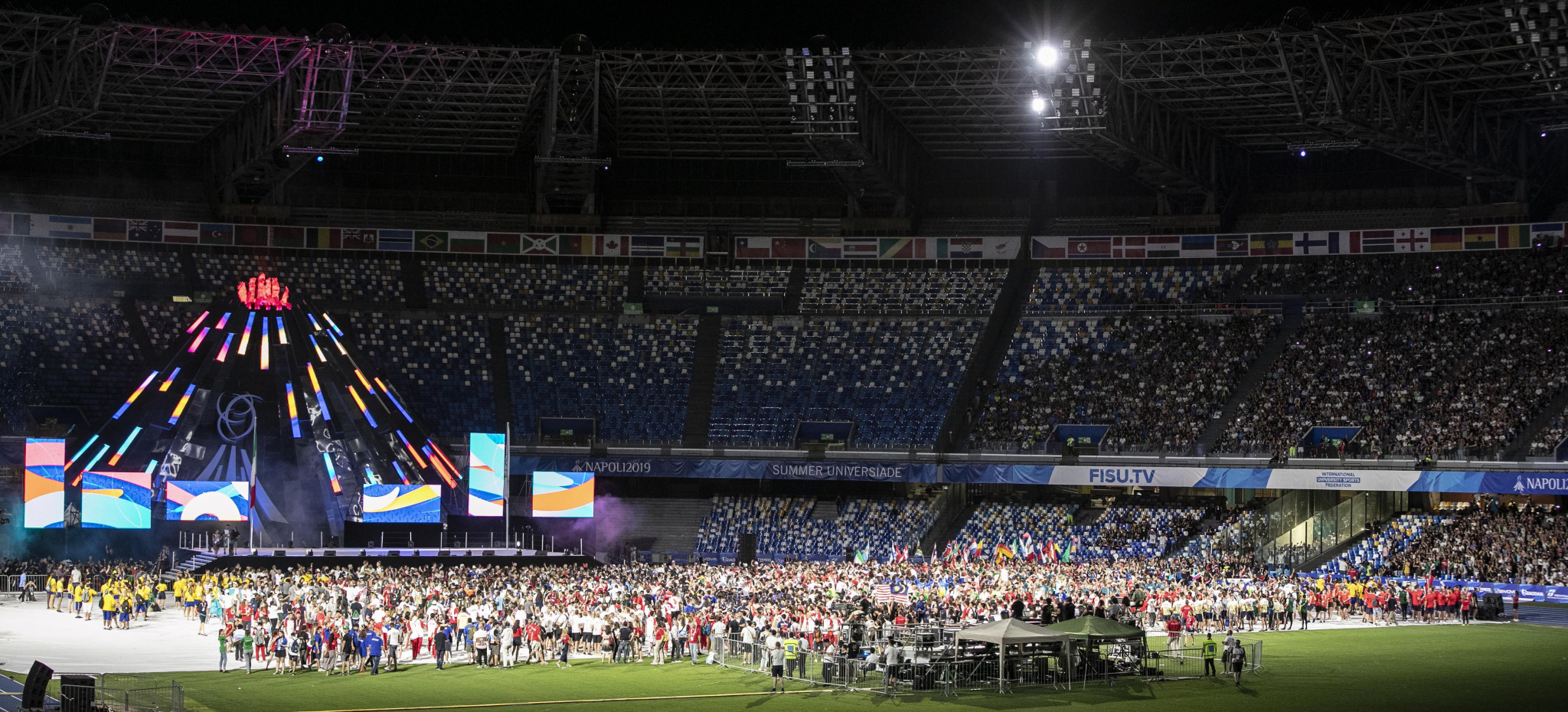 They congregated in front of the Universiade cauldron for speeches and a concert ©Naples 2019