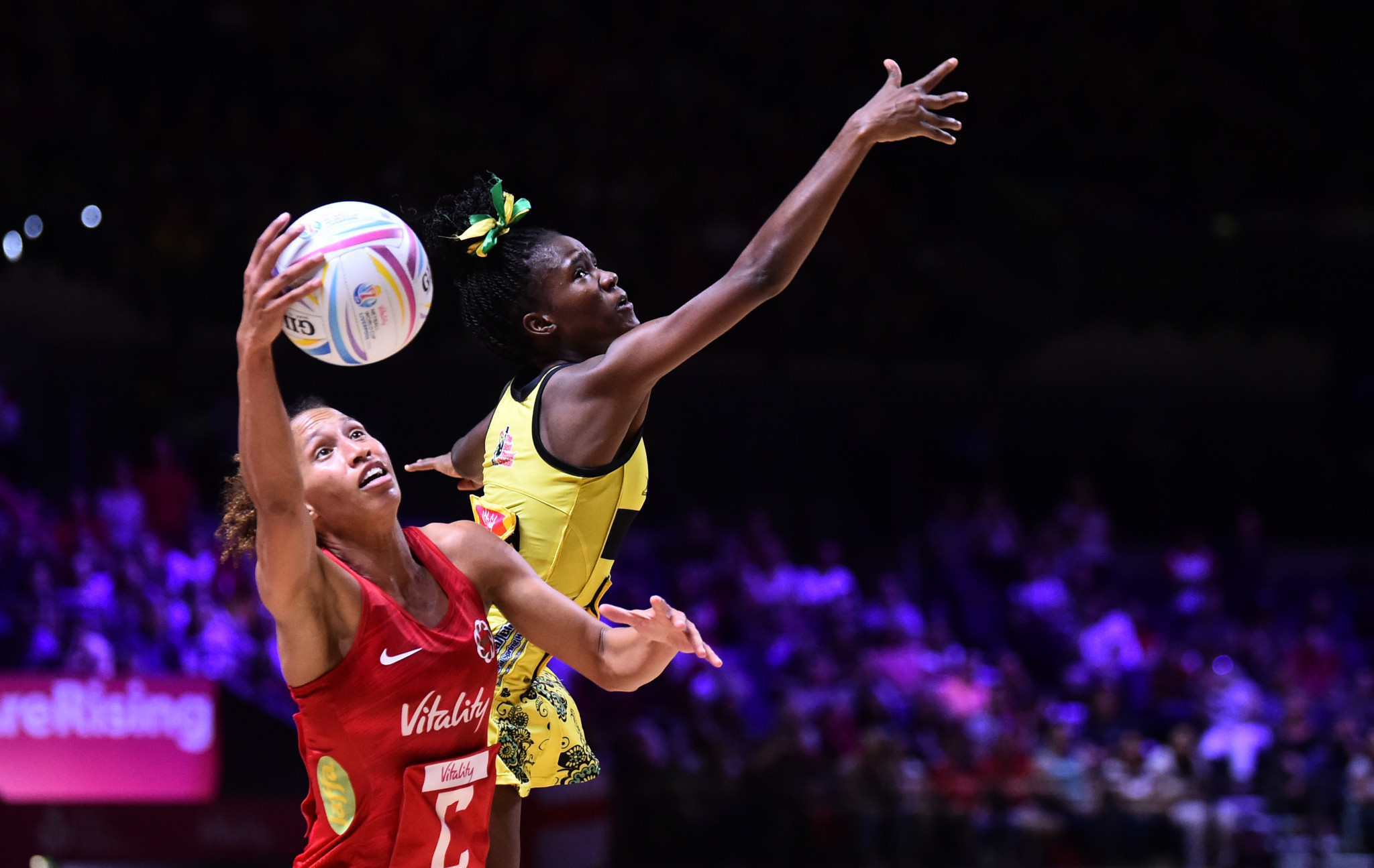 England's Serena Guthrie and Nicole Dixon of Jamaica battle for possession ©Getty Images