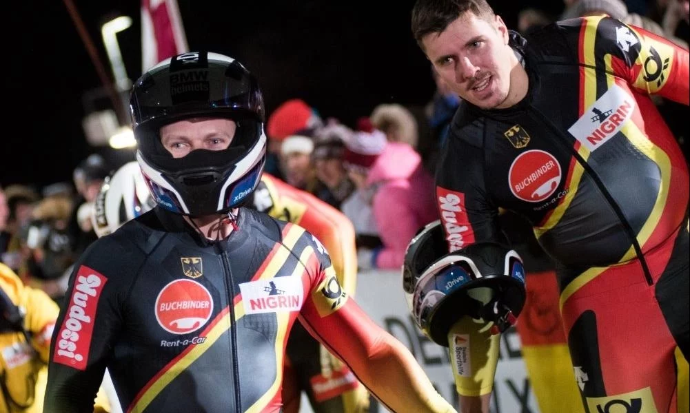 Bobsleigh push athlete Jannis Bäcker, right, has called time on his career ©IBSF