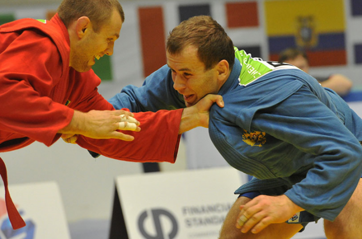Alsim Chernoskulov (blue) brought up Russia's hat-trick of gold medals by overcoming Ukraine's Ivan Vasylchuk in the men's 90kg final