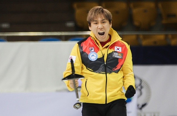 South Korea's men's skip Soo Hyuk Kim celebrates his team's victory