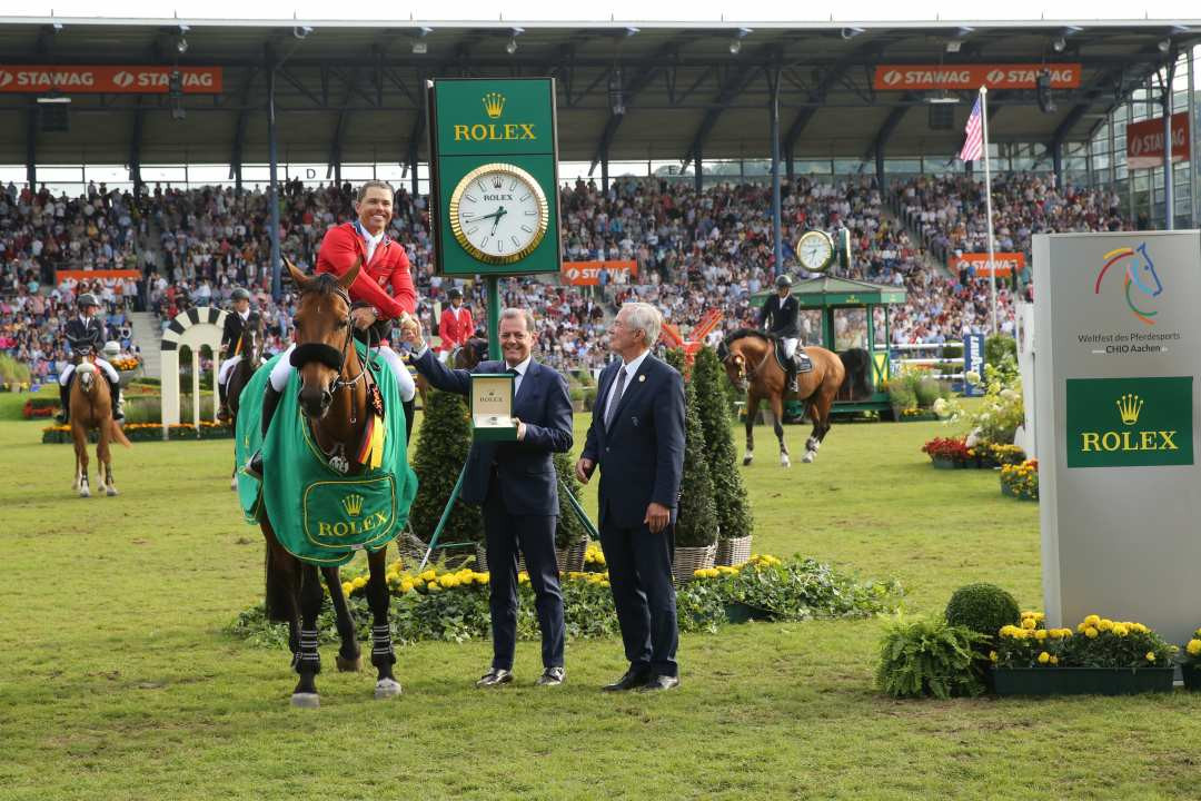 Kent Farrington of the United States, riding Gazelle, is congratulated upon winning the Rolex Grand Prix in show jumping at Aachen tonight ©CHIO Aachen
