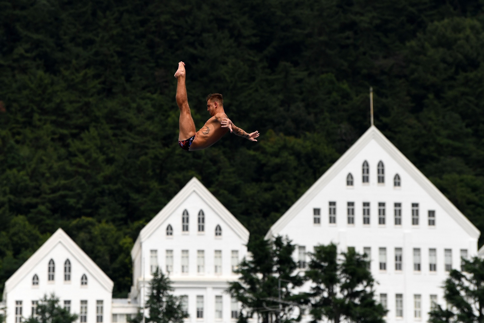 Russia's Nikita Fedotov competes in a round of the men's high diving event at Chosun University in Gwangju ©Getty Images