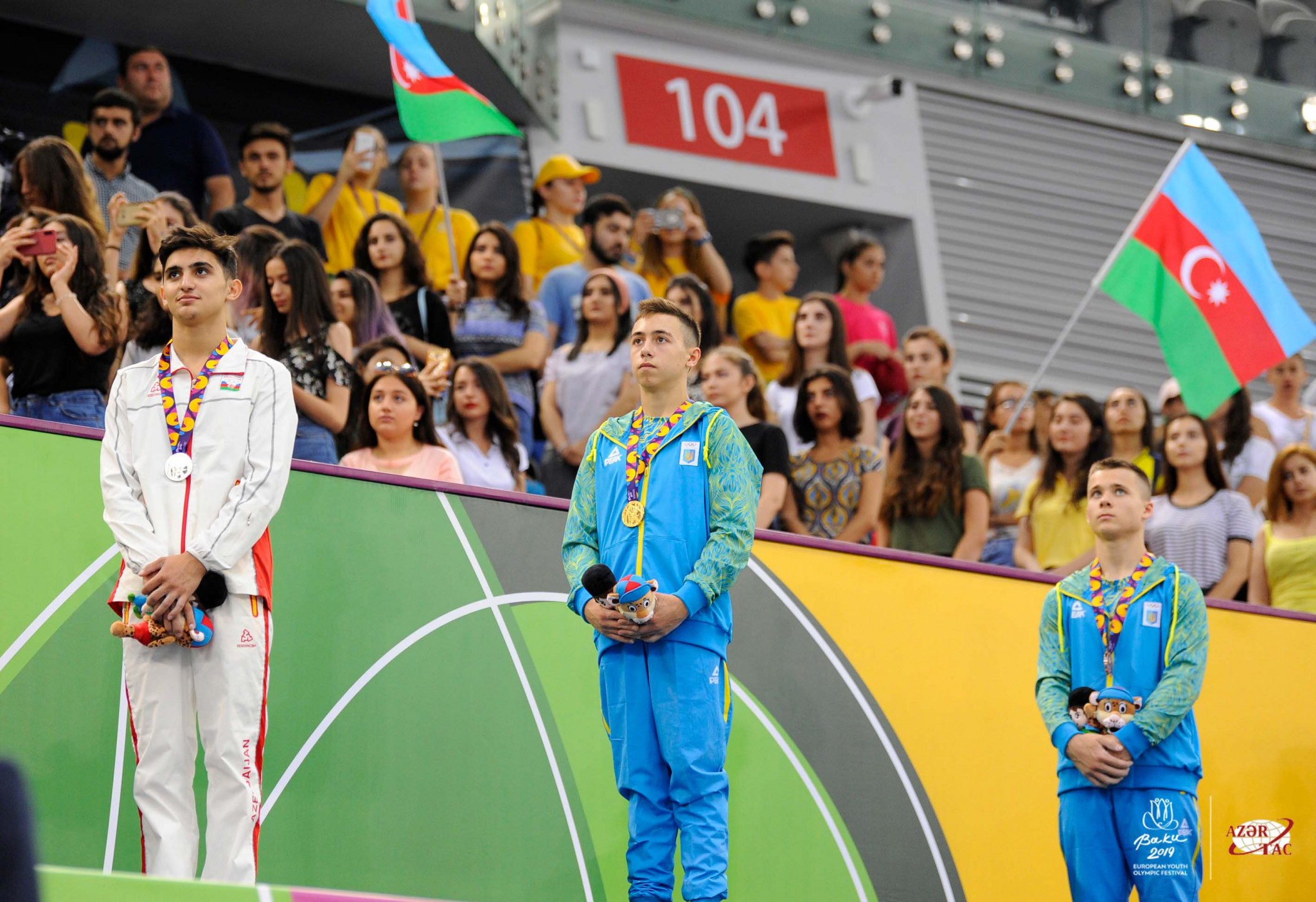 Ukraine’s Nazar Chepurnyi receives the second of his gold medals of the night at the artistic gymnastics apparatus finals in Baku Gymnastics Arena ©EYOF