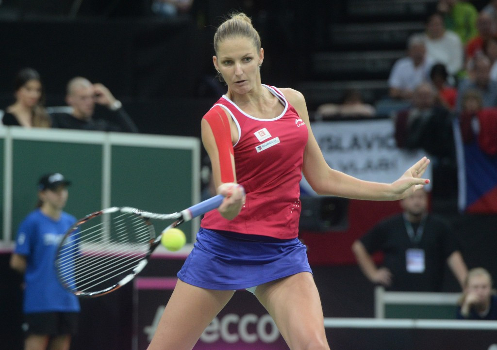 Karolína Plíšková won both her singles and doubles match to help the hosts retain the title