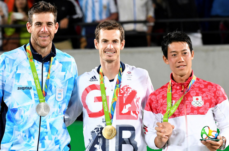 Kei Nishikori pictured, right, with Olympic bronze at Rio 2016 alongside  silver medallist Argentina's Juan Martin Del Potro, left, and Britain's successful defending champion Andy Murray ©Getty Images
