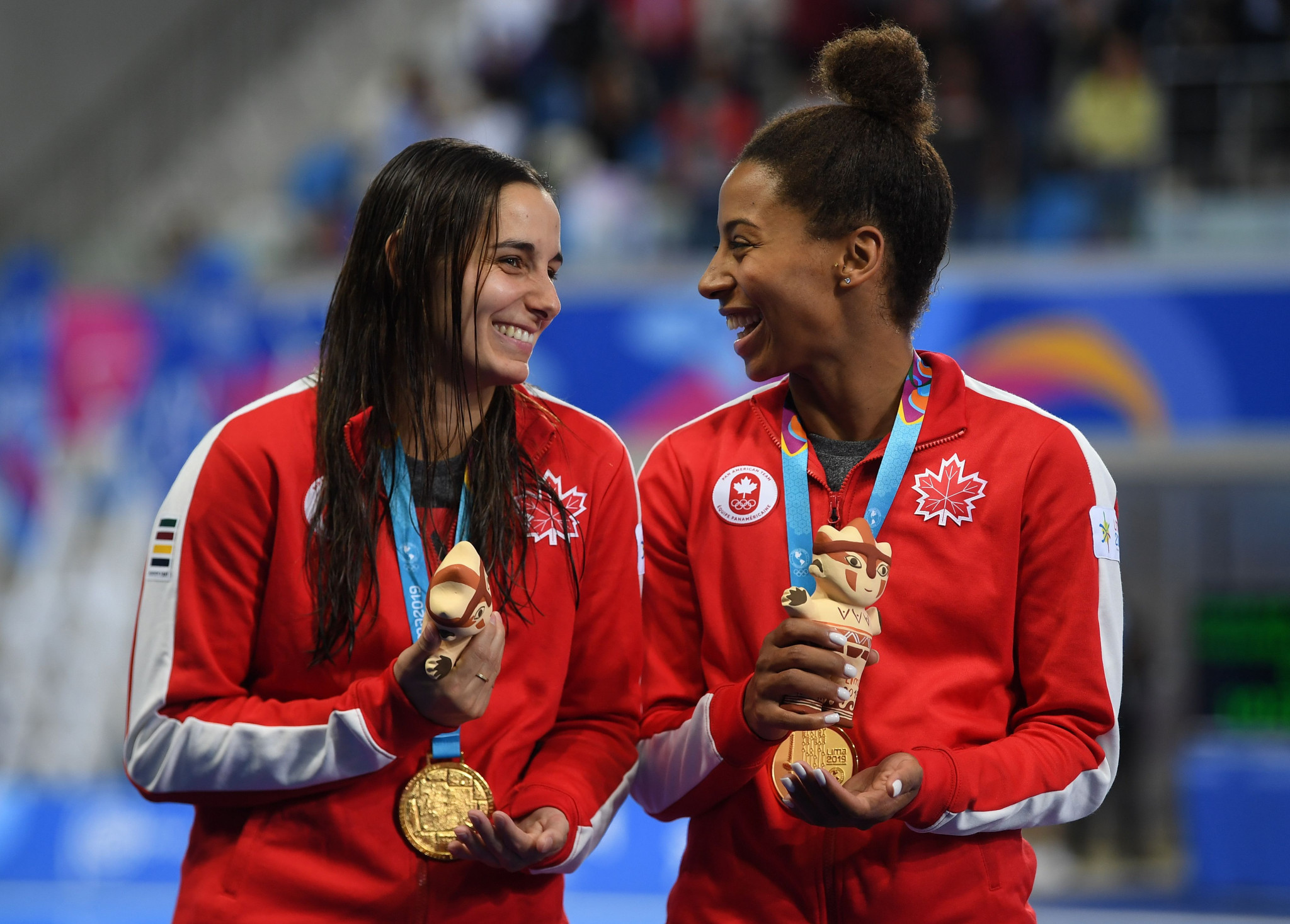 Canada's Pamela Ware and Jennifer Abel earned the gold ©Getty Images