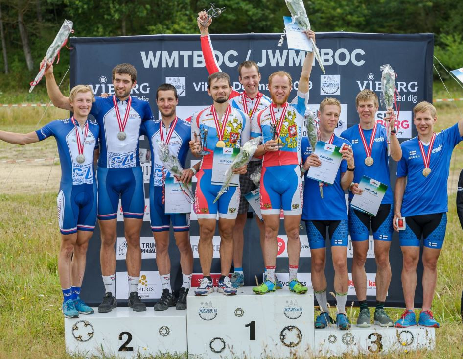 Anton Foliforov, Valeriy Gluhov and Grigory Medvedev secured men's relay gold for Russia at the World Mountain Bike Orienteering Championships in Denmark ©IOF 