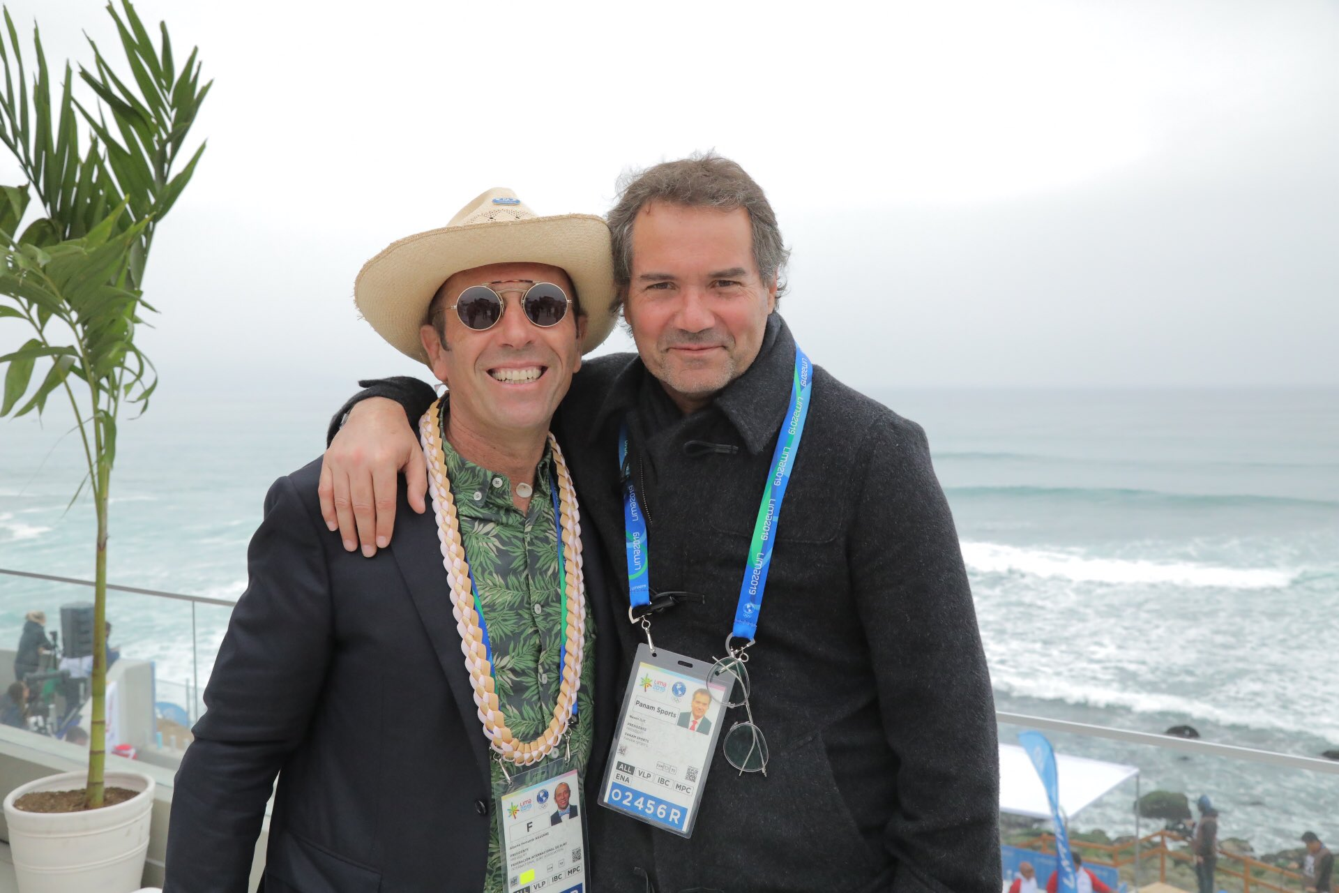 ISA President Fernando Aguerre, left, welcomed Panam Sports President Neven Ilic to surfing competition at the Games ©Panam Sports