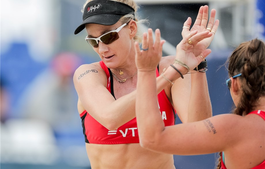 Birthday girl Walsh Jennings and partner Sweat top pool at FIVB Beach World Tour event in Moscow