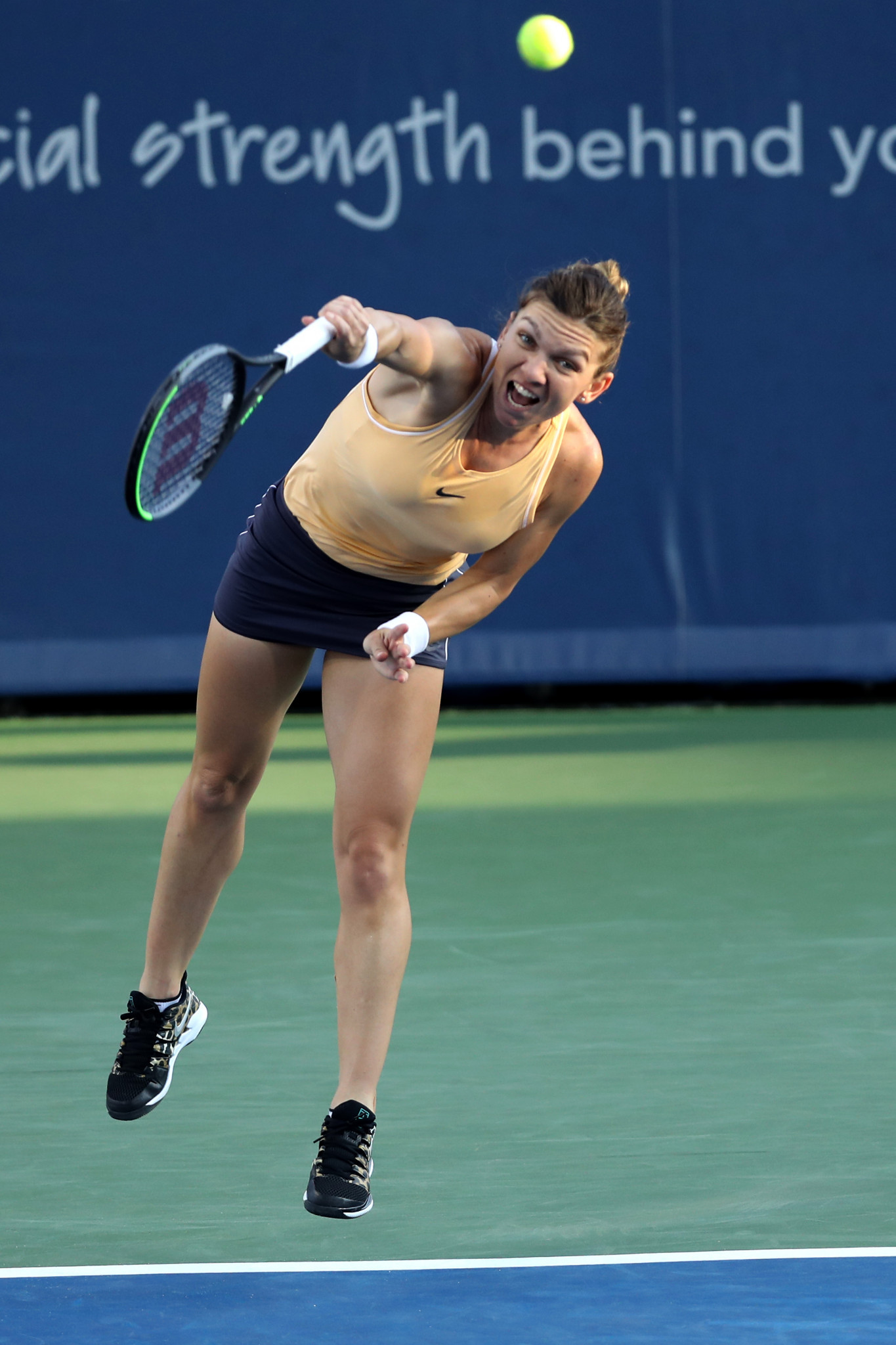 Simona Halep of Romania serves during her last 16 defeat to American Madison Keys ©Getty Images