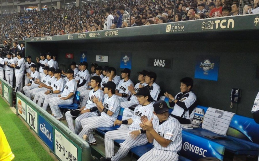 Japanese players in the dugout during their last-gasp semi-final defeat ©WBSC