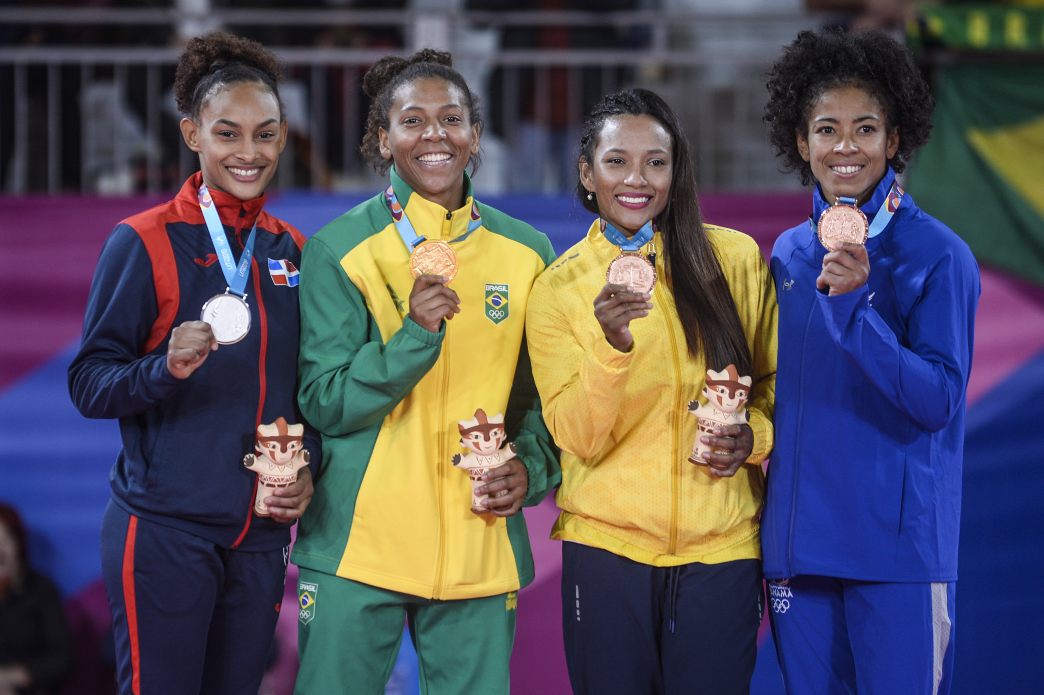 Silva, centre left, won gold in the 57 kilogram category at Lima 2019 Pan American Games ©Getty Images