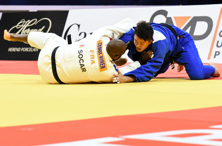 Rio 2016 champion Teddy Riner and Japan's Hisayoshi Harasawa in action during last month's Grand Prix final in Montreal ©IJF
