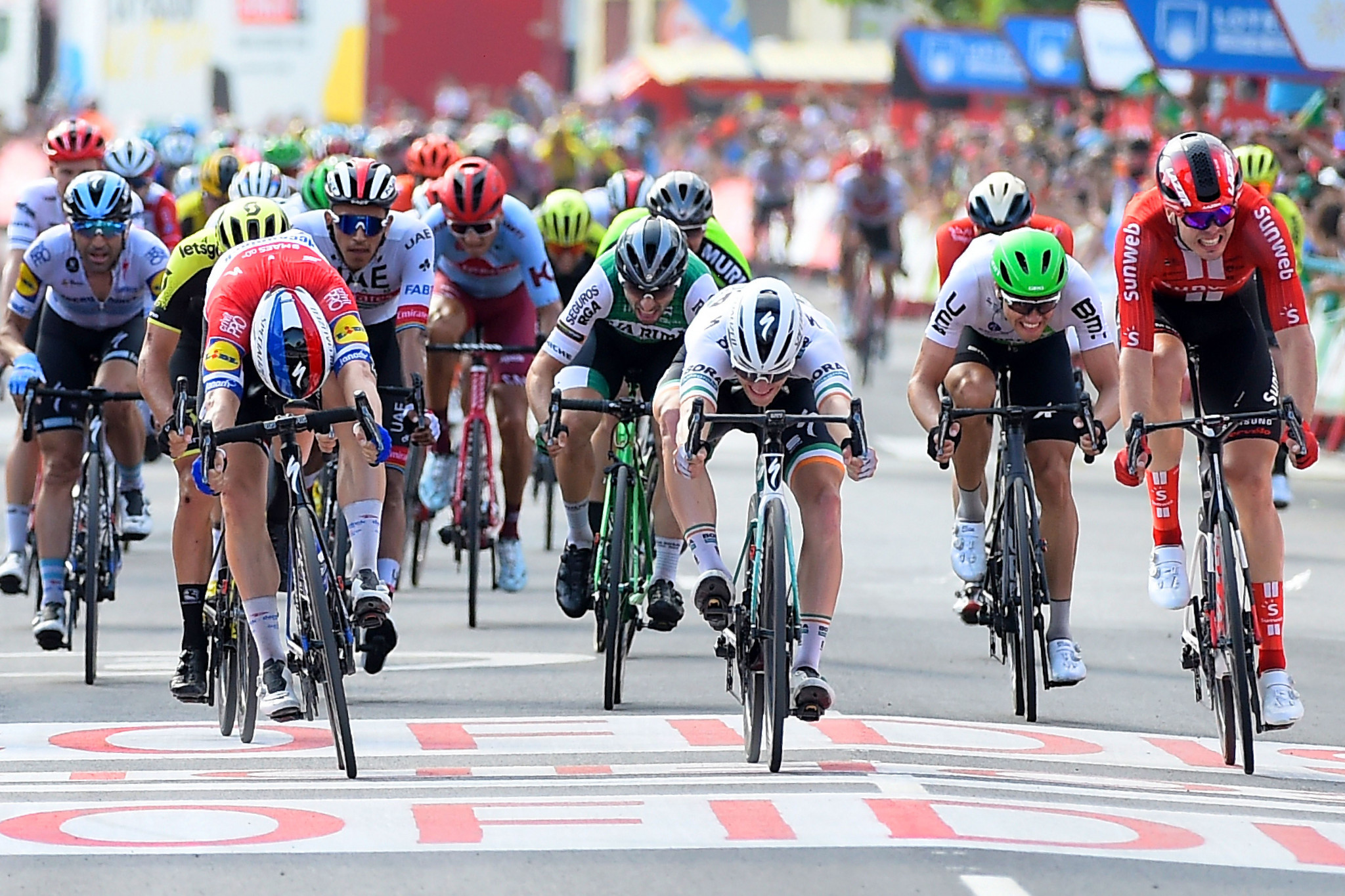 Jakobsen earns narrow victory to win first Grand Tour stage at Vuelta a España