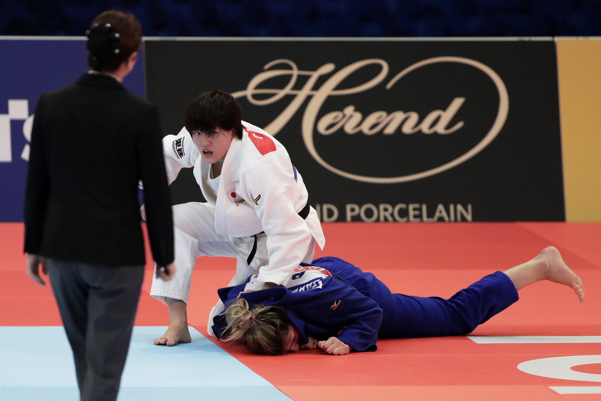Reigning under-70kg world champion Chizuru Arai suffered a shock third round exit ©Getty Images