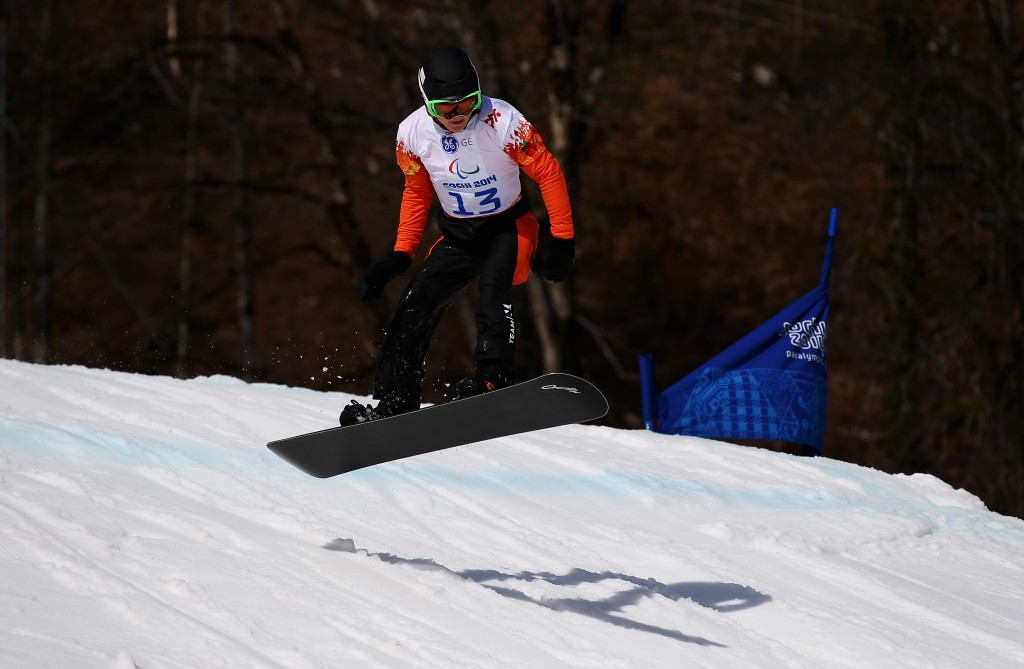 Dutchman Chris Vos got off to the best possible start in defence of his IPC Snowboard World Cup crown with victory in the SB-LL1 event