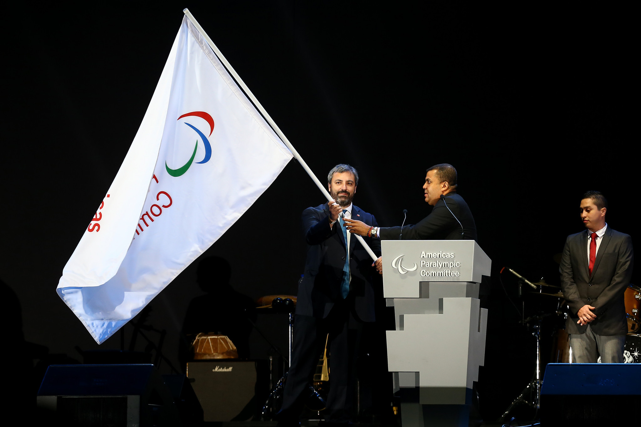 The Americas Paralympic Committee flag was handed to Chilean sports undersecretary Andres Otero Klein, a representative from Santiago 2023 ©Getty Images
