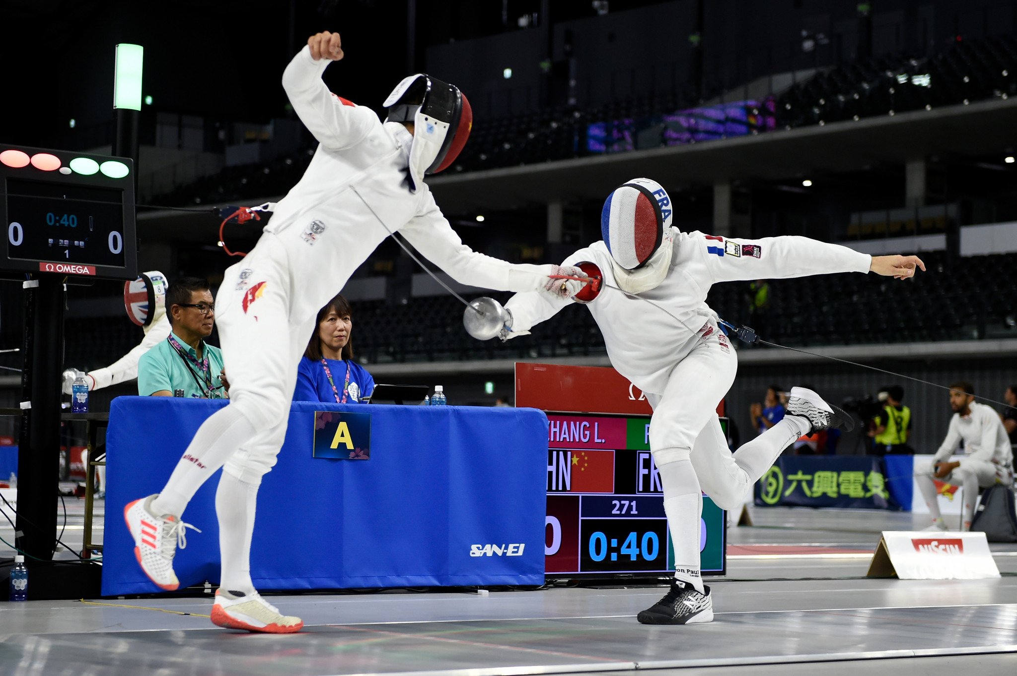 China's Zhang Linbin, left, made a promising start to the men's individual event ©Getty Images