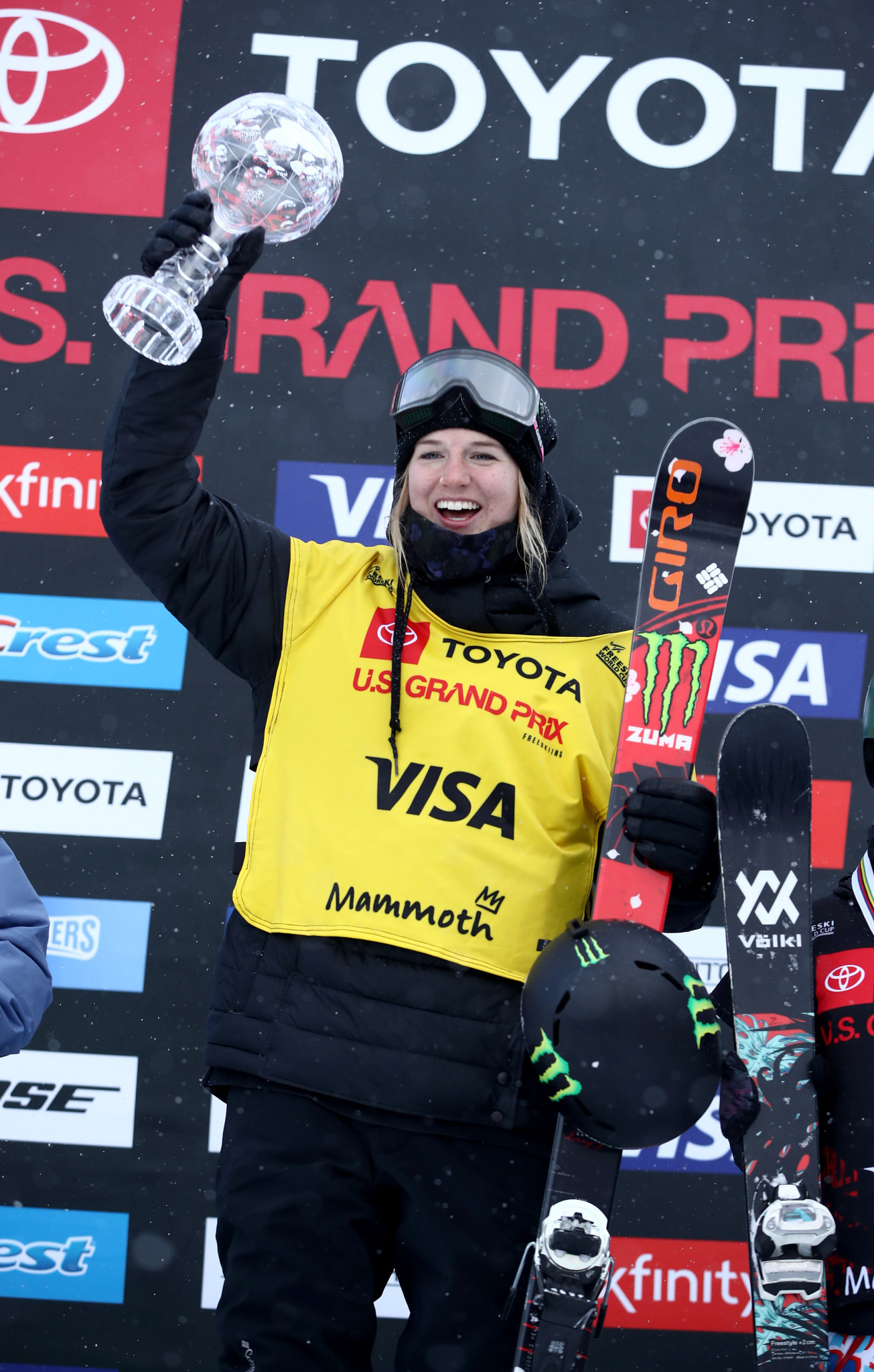 Cassie Sharpe of Canada celebrates on the podium after receiving the globe for being the overall champion for the 2018 season ©Getty Images