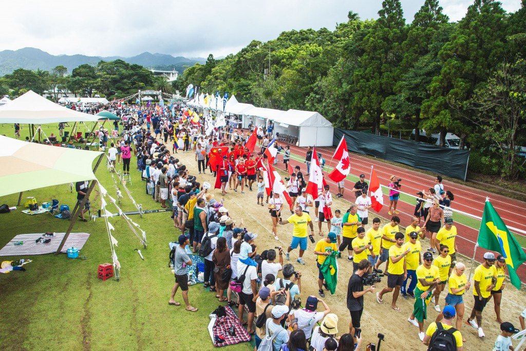 The opening day of the ISA World Surfing Games in Miyazaki got underway with a Parade of Nations involving representatives from the 55 competing countries ©ISA