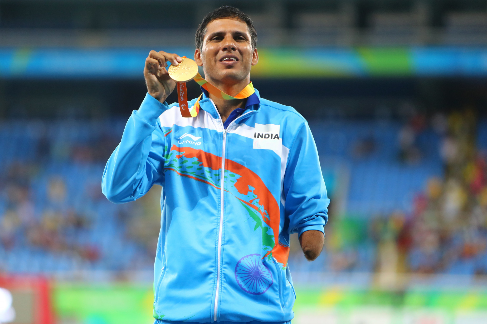 Devendra Jhajharia of India poses on the podium at the Rio 2016 Paralympic Games after winning the men's F46 javelin gold medal ©Getty Images