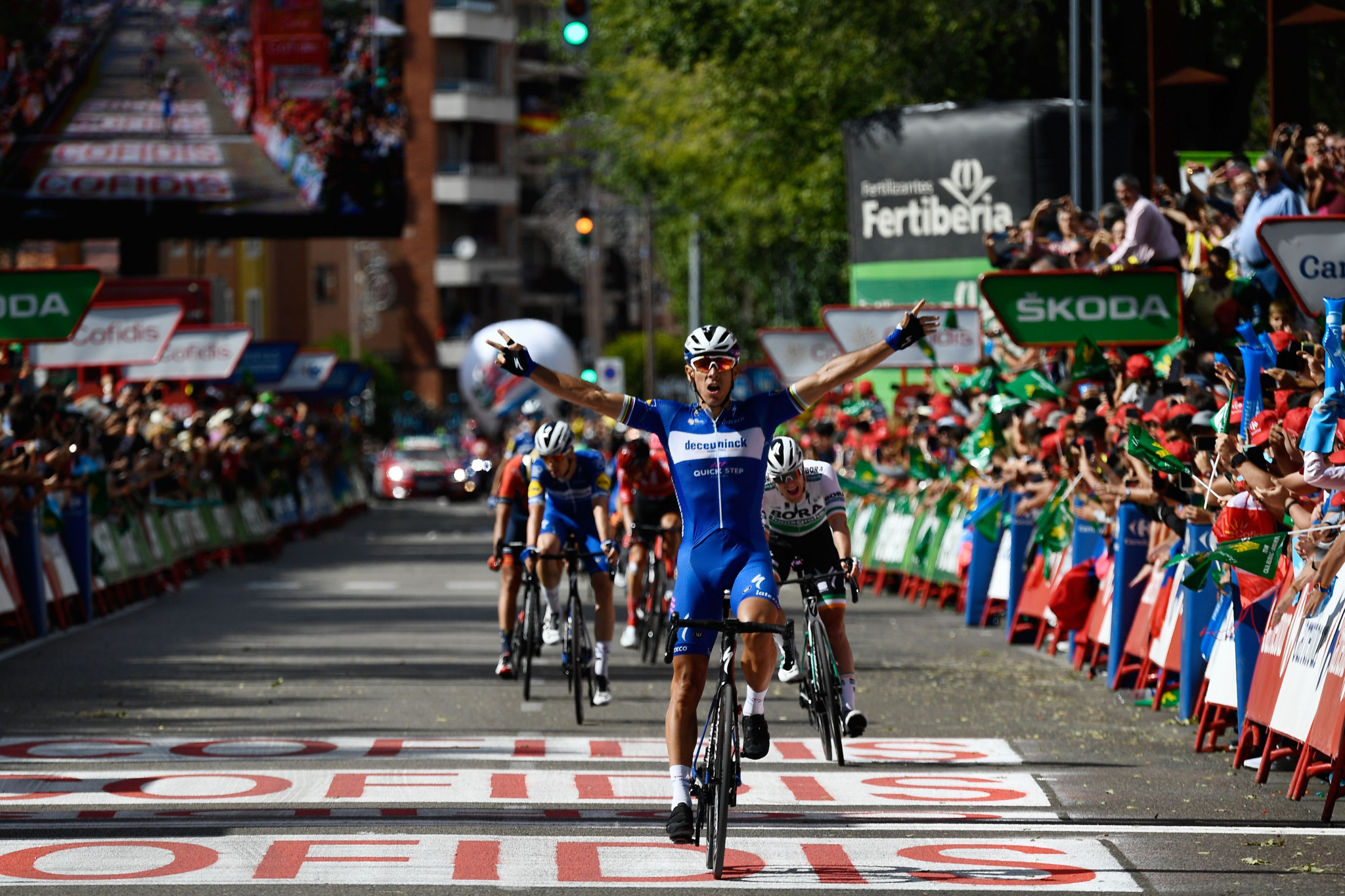 Gilbert sprints to stage 17 victory as Roglič retains Vuelta a España lead