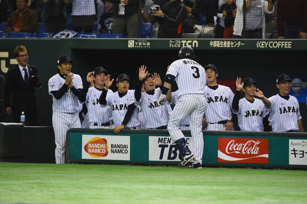 Japan celebrate after another home run, this time by Nobuhiro Matsuda ©Getty Images