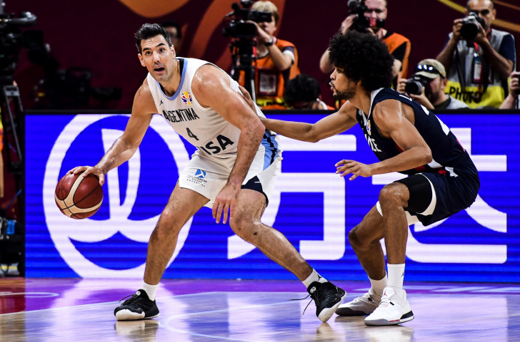France had no answer to Argentina's 39-year-old Luis Scola, left, in today's FIBA Men's World Cup semi-final in Beijing ©Getty Images
