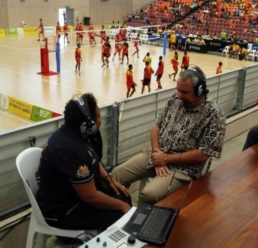Sports Minister Justin Tkatchenko being interviewed by a local journalist during July's Pacific Games in Port Moresby ©ITG